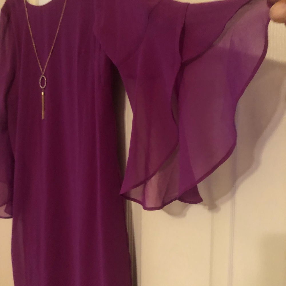 Purple dress from Macy never been wore still have tags attached